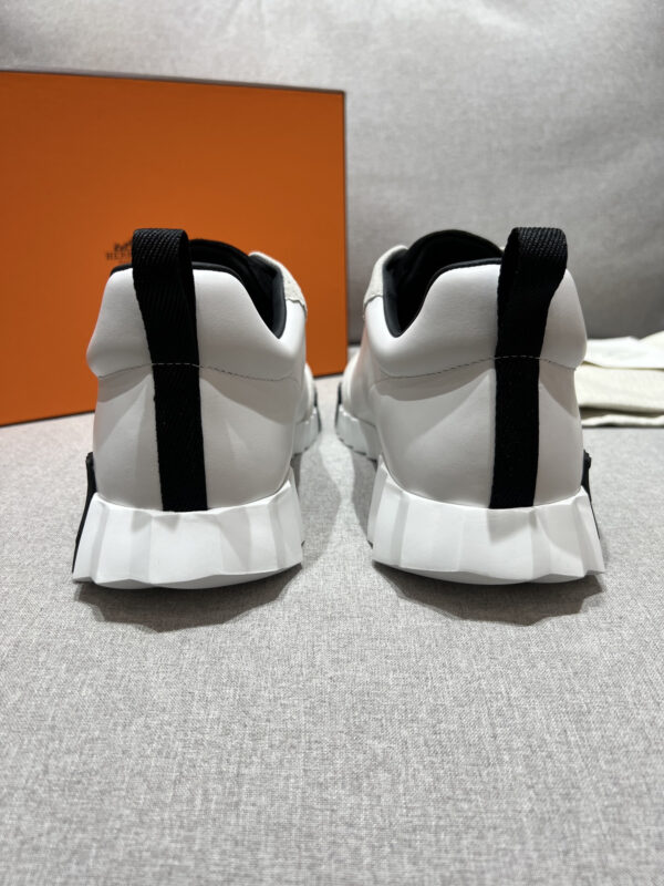 7 Hermès White Leather & Suede Low-Top Sneakers with Black H Logo Sole
