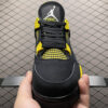 8 (1) Air Jordan 4 Retro Thunder Black & Yellow Sneakers - Classic Basketball & Streetwear Shoes