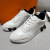 ScreenShot_2026-06-09_204459_592 Hermès White Leather & Suede Low-Top Sneakers with Black H Logo Sole