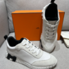 ScreenShot_2026-06-09_204548_824 Hermès White Leather & Suede Low-Top Sneakers with Black H Logo Sole